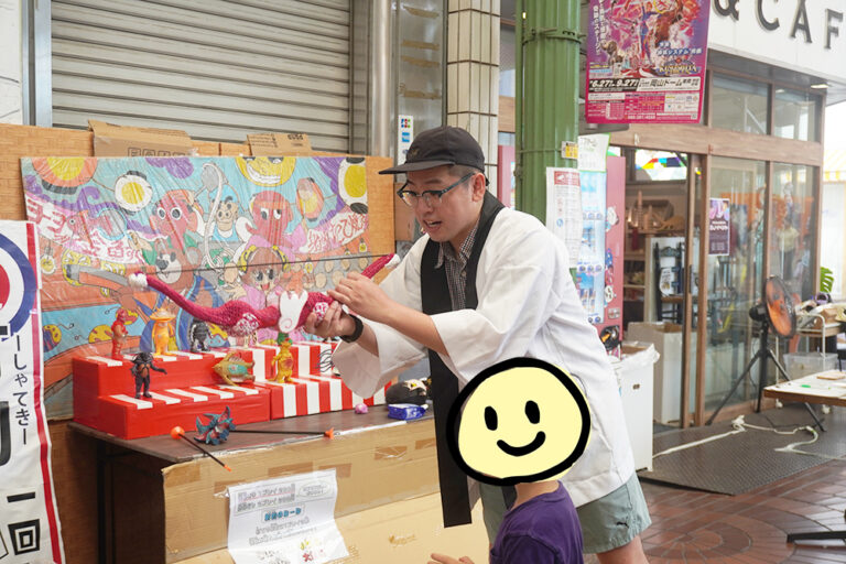 射的ブース、レクチャーをしている